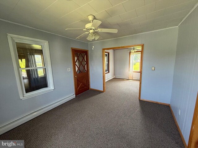 11 Gray Ridge Ln, Berkeley Springs, WV 25411 - empty room with a baseboard heating unit, crown molding, healthy amount of natural light, carpet floors, and a ceiling fan