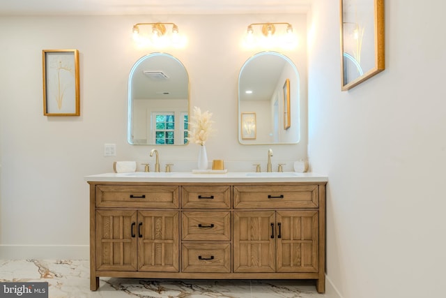 5303 Rolling Rd, Springfield, VA 22151 - full bath featuring marble look tile flooring and double vanity