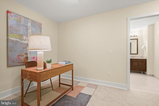 910 M St NW Unit 116, Washington, DC 20001 - home office with baseboards and light carpet