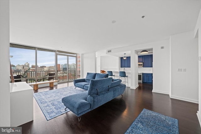 105 Christina Lndg Unit 1402, Wilmington, DE 19801 - living room featuring dark wood-style floors, floor to ceiling windows, and a city view
