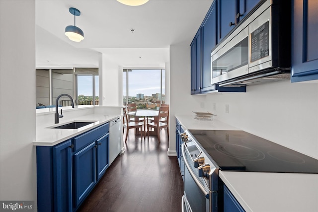 105 Christina Lndg Unit 1402, Wilmington, DE 19801 - kitchen with blue cabinets, appliances with stainless steel finishes, and dark wood finished floors