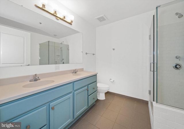 105 Christina Lndg Unit 1402, Wilmington, DE 19801 - bathroom with double vanity, a shower stall, and tile patterned flooring