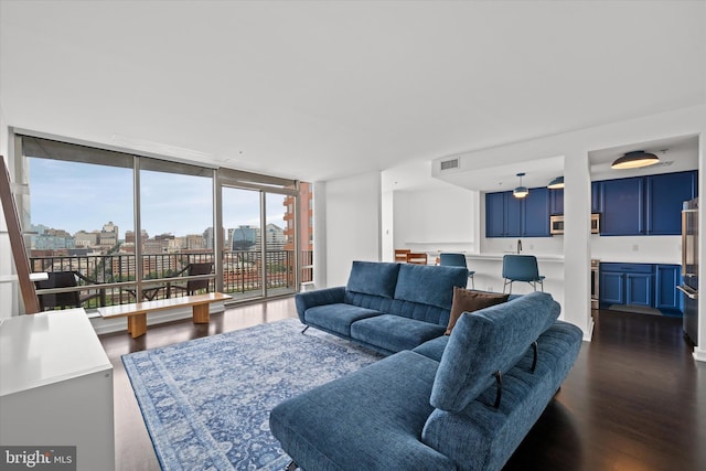 105 Christina Lndg Unit 1402, Wilmington, DE 19801 - living room featuring dark wood-type flooring, floor to ceiling windows, and a view of city