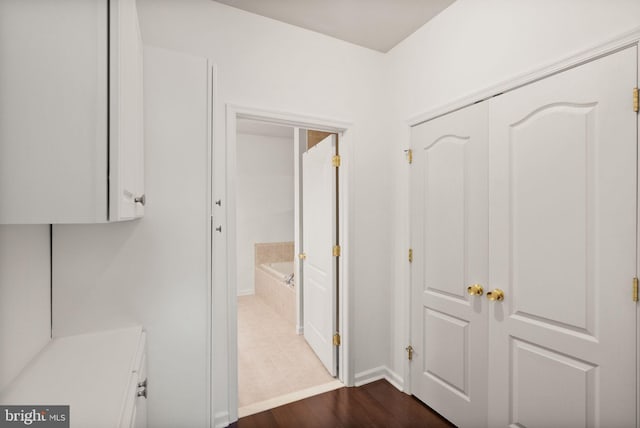 9710 Handerson Pl Unit 1, Manassas Park, VA 20111 - hall with dark wood finished floors and baseboards