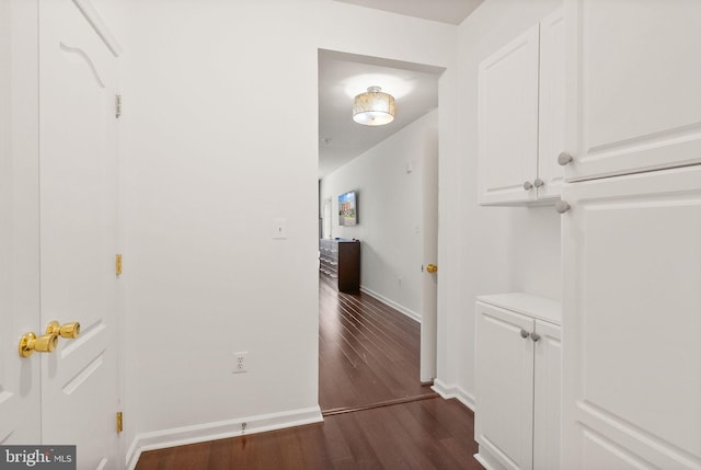 9710 Handerson Pl Unit 1, Manassas Park, VA 20111 - hallway with dark wood-style floors and baseboards