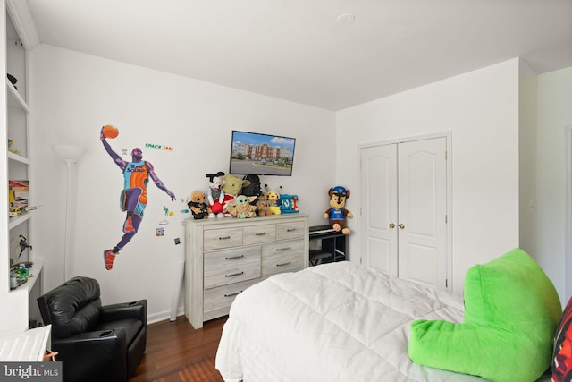 9710 Handerson Pl Unit 1, Manassas Park, VA 20111 - bedroom featuring dark wood finished floors and a closet
