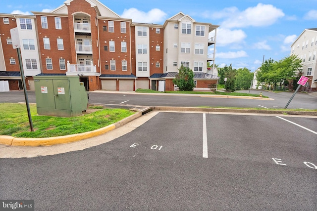 9710 Handerson Pl Unit 1, Manassas Park, VA 20111 - view of apartment building / complex with uncovered parking