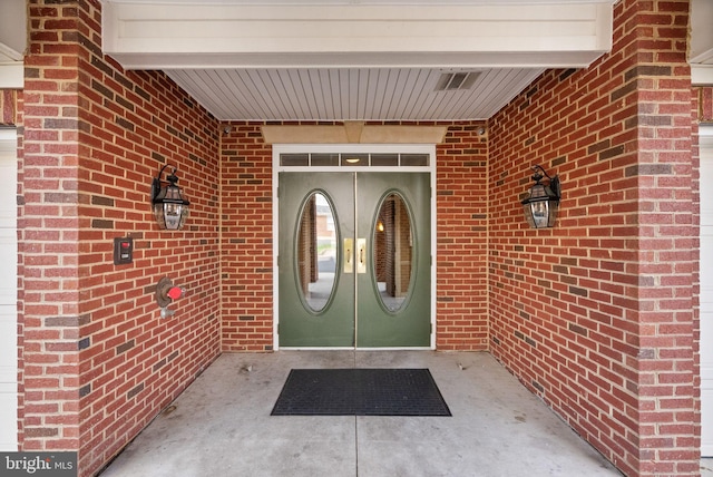 9710 Handerson Pl Unit 1, Manassas Park, VA 20111 - property entrance with french doors and brick siding
