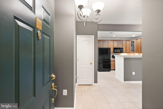 9710 Handerson Pl Unit 1, Manassas Park, VA 20111 - entrance foyer with light tile patterned floors, a chandelier, and recessed lighting