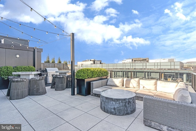 1300 4th St SE Unit 908, Washington, DC 20003 - view of patio with an outdoor hangout area and an outdoor kitchen