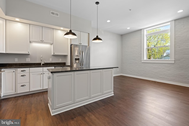413 Jefferson St Unit 5, East Greenville, PA 18041 - kitchen featuring stainless steel fridge, a kitchen island, dark wood-style flooring, decorative light fixtures, and recessed lighting
