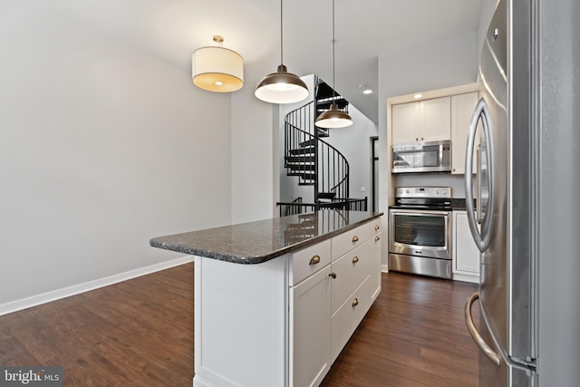 413 Jefferson St Unit 5, East Greenville, PA 18041 - kitchen featuring appliances with stainless steel finishes, a kitchen island, dark wood-style floors, and white cabinetry
