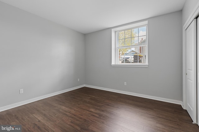 413 Jefferson St Unit 5, East Greenville, PA 18041 - unfurnished bedroom with dark wood-style flooring and a closet