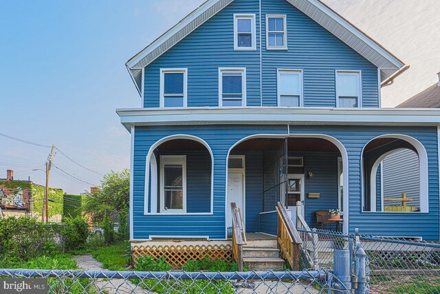 604 E 31st St, Baltimore, MD 21218 - view of front of house with covered porch