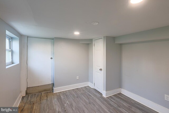 604 E 31st St, Baltimore, MD 21218 - basement featuring wood finished floors