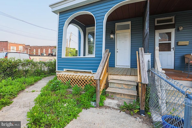604 E 31st St, Baltimore, MD 21218 - view of exterior entry featuring covered porch