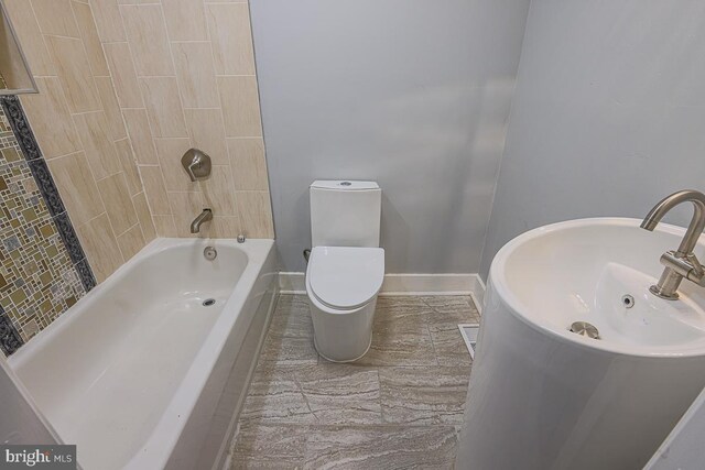604 E 31st St, Baltimore, MD 21218 - full bathroom with toilet and bathtub / shower combination