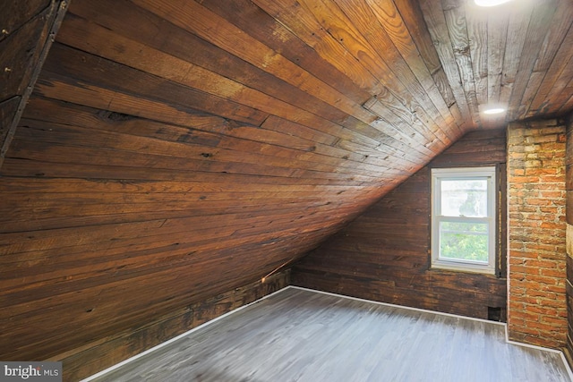 604 E 31st St, Baltimore, MD 21218 - bonus room featuring wood walls, wooden ceiling, vaulted ceiling, and dark wood-style floors