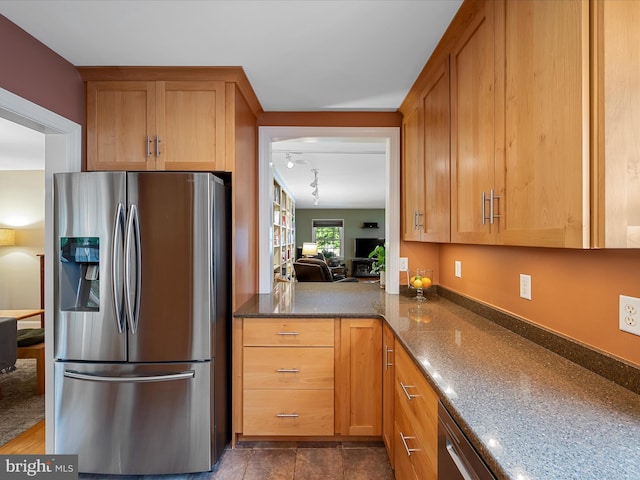 101 Morgan St, Winchester, VA 22601 - kitchen with stainless steel refrigerator with ice dispenser and dark stone countertops