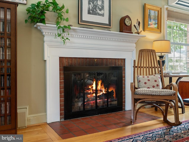 101 Morgan St, Winchester, VA 22601 - detailed view of a brick fireplace and wood finished floors