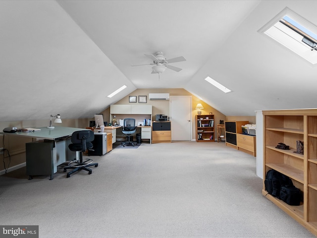 101 Morgan St, Winchester, VA 22601 - carpeted office featuring a skylight, a wall mounted AC, ceiling fan, and vaulted ceiling