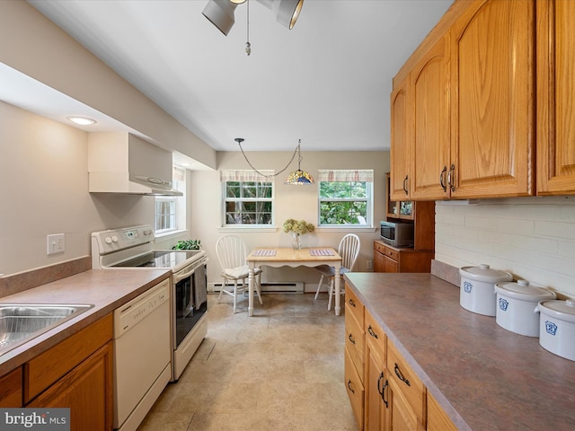 101 Morgan St, Winchester, VA 22601 - kitchen featuring white appliances, backsplash, dark countertops, a baseboard radiator, and hanging light fixtures