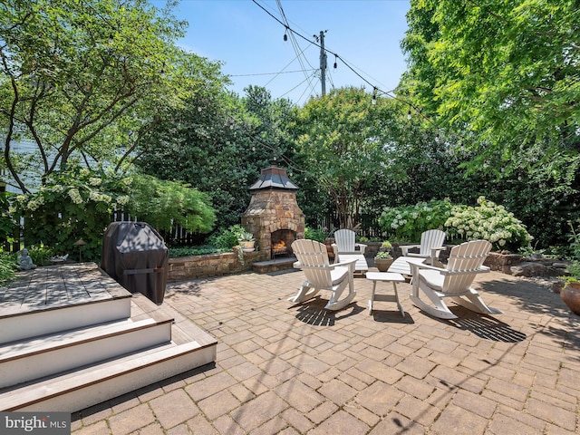 101 Morgan St, Winchester, VA 22601 - view of patio / terrace featuring an outdoor stone fireplace and grilling area
