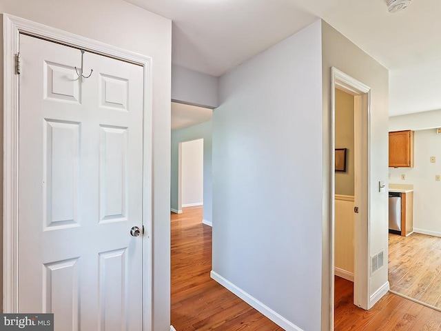 1035 Deerfield Cir, Perkasie, PA 18944 - corridor with light wood-type flooring and baseboards
