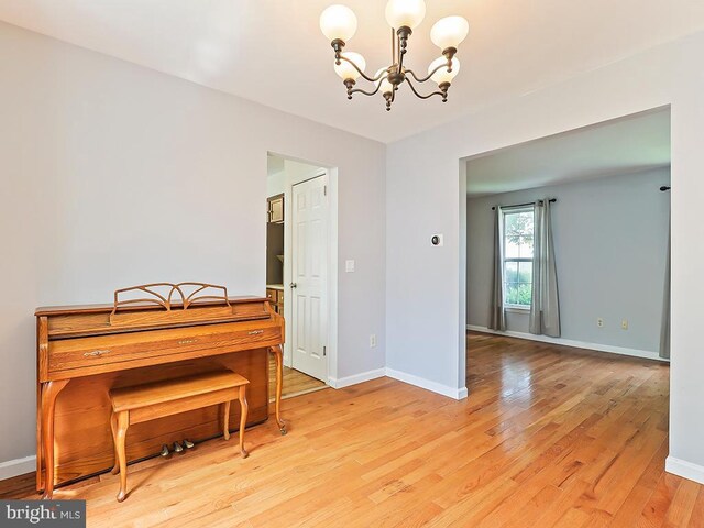 1035 Deerfield Cir, Perkasie, PA 18944 - dining space with a chandelier and light wood-style floors