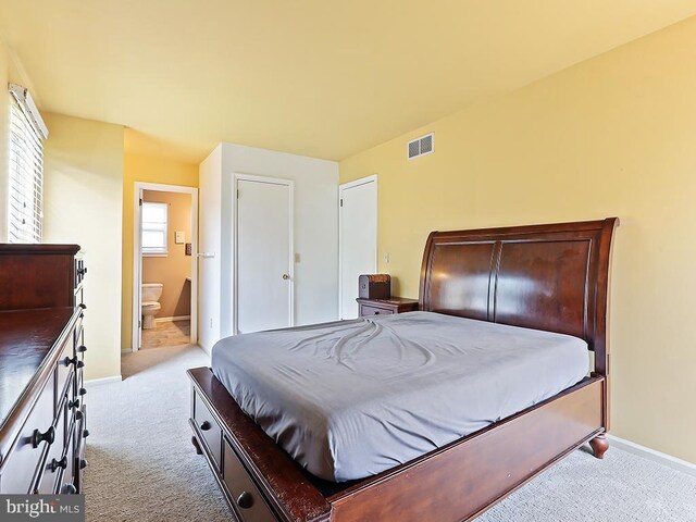 1035 Deerfield Cir, Perkasie, PA 18944 - bedroom with light colored carpet and ensuite bath