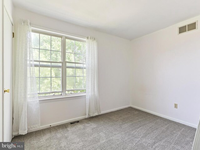 1035 Deerfield Cir, Perkasie, PA 18944 - empty room featuring carpet flooring and baseboards