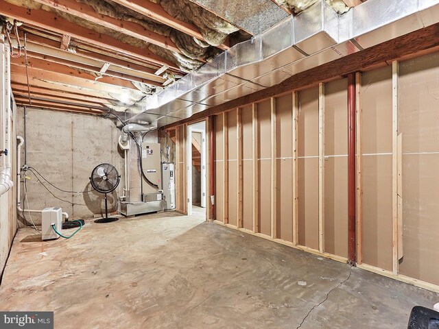 1035 Deerfield Cir, Perkasie, PA 18944 - unfinished basement with water heater and heating unit