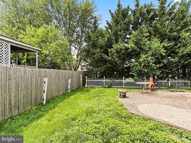 1035 Deerfield Cir, Perkasie, PA 18944 - fenced backyard with a patio