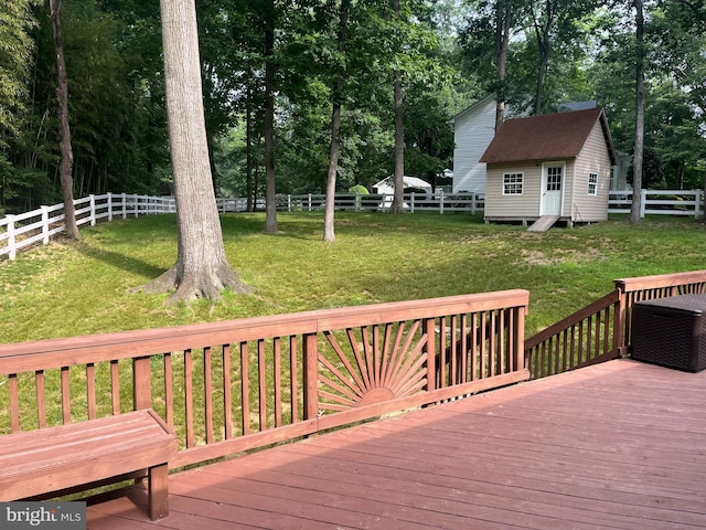 35904 Army Navy Dr, Mechanicsville, MD 20659 - wooden terrace with a fenced backyard, view of wooded area, and an outbuilding