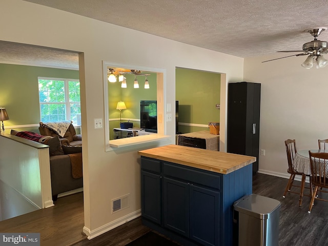 35904 Army Navy Dr, Mechanicsville, MD 20659 - kitchen with butcher block countertops, dark wood-style flooring, a textured ceiling, and ceiling fan