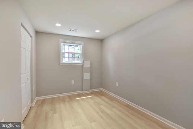 982 Branch Dr, Herndon, VA 20170 - unfurnished bedroom featuring light wood-type flooring, a closet, and recessed lighting