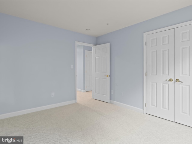 1473 Northern Neck Dr, Vienna, VA 22182 - unfurnished bedroom featuring carpet flooring and a closet