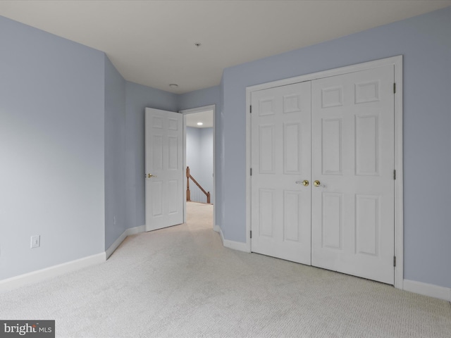 1473 Northern Neck Dr, Vienna, VA 22182 - unfurnished bedroom featuring carpet and a closet