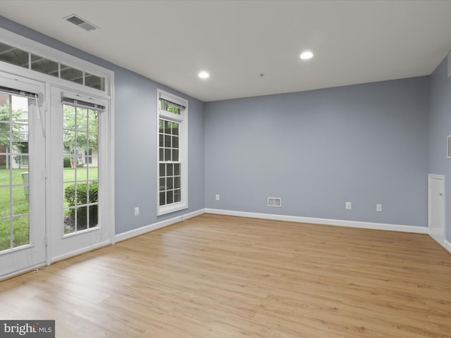 1473 Northern Neck Dr, Vienna, VA 22182 - unfurnished room featuring light wood-style floors and recessed lighting