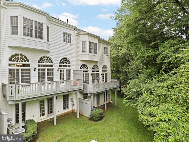 1473 Northern Neck Dr, Vienna, VA 22182 - rear view of house featuring a yard and a wooden deck