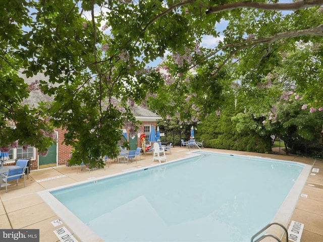 1473 Northern Neck Dr, Vienna, VA 22182 - community pool featuring a patio