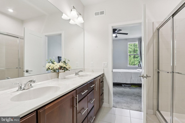 213 Wynstone Ct, Colmar, PA 18915 - full bathroom with ensuite bathroom, double vanity, tile patterned floors, a ceiling fan, and a stall shower