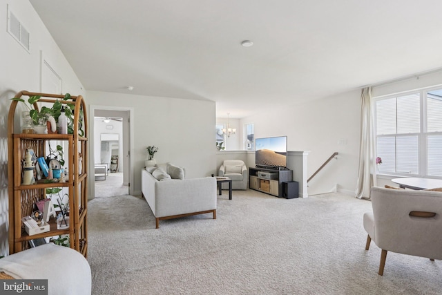 213 Wynstone Ct, Colmar, PA 18915 - living room featuring light carpet and a chandelier