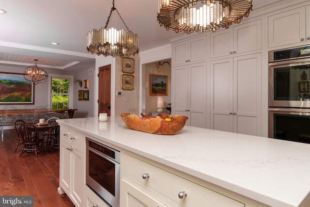 1032 N New St, West Chester, PA 19380 - kitchen featuring a chandelier, double oven, dark wood-style floors, recessed lighting, and pendant lighting