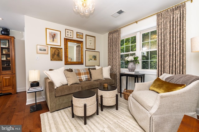 1032 N New St, West Chester, PA 19380 - living room featuring wood finished floors and a chandelier