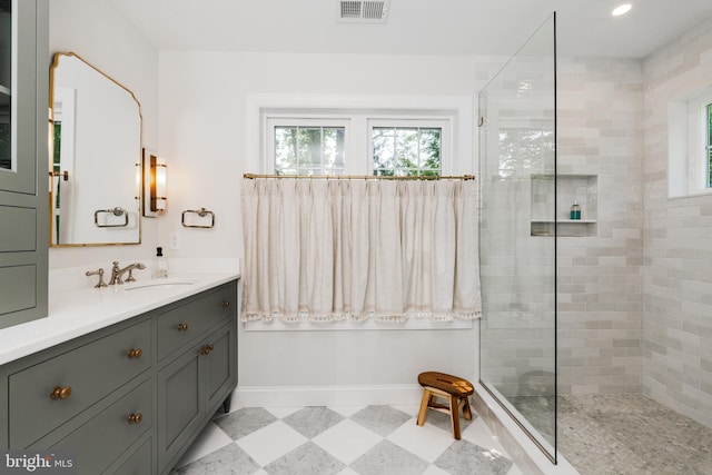 1032 N New St, West Chester, PA 19380 - bathroom with vanity, walk in shower, recessed lighting, and tile patterned floors