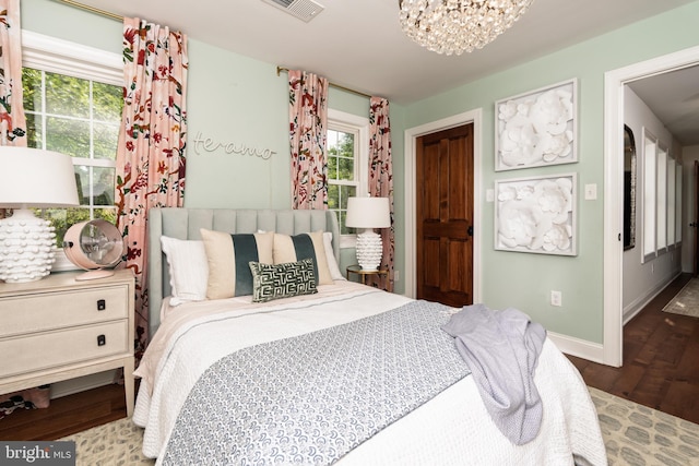 1032 N New St, West Chester, PA 19380 - bedroom featuring a chandelier, multiple windows, and wood finished floors