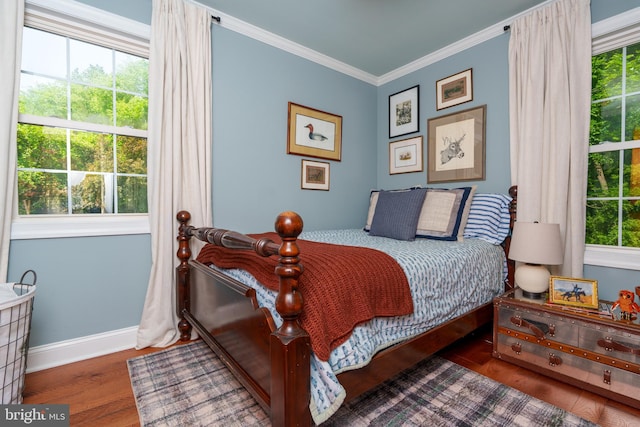 1032 N New St, West Chester, PA 19380 - bedroom featuring ornamental molding and wood finished floors