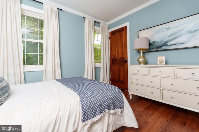 1032 N New St, West Chester, PA 19380 - bedroom with dark wood-type flooring, crown molding, and multiple windows