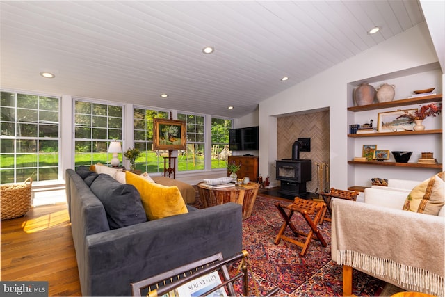 1032 N New St, West Chester, PA 19380 - living room featuring a wood stove, wood finished floors, recessed lighting, lofted ceiling, and wooden ceiling